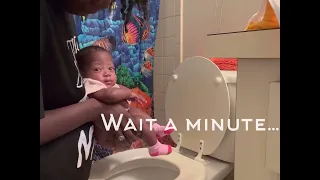 Newborn using Elimination Communication over toilet 😍💕😅