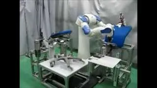 Motoman dual arm robot assembling a chair