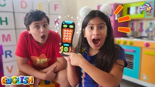 Maria Clara and JP pretend play with magical remote control