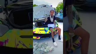 Rapper Tekashi 6ix9ine Talking Trash and Flexing Fake Money on a Lamborghini Aventador!