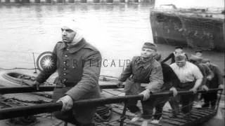 Allied troops are taken aboard a ship and are helped by British troops during eva...HD Stock Footage