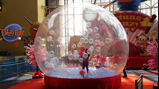 Snowglobe with floating balloons