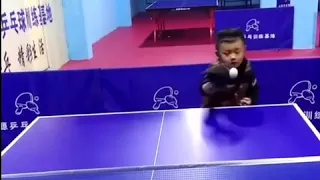 chinese little kids play table tennis