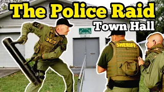 POLICE RAID TOWN HALL