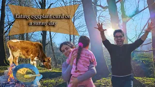 "The joy of cooking eggplant curd by the river on a warm winter day"