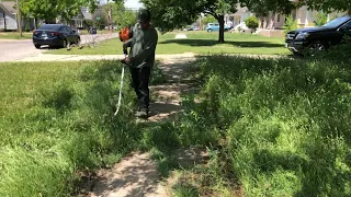 Mowing tall grass and clearing a sidewalk | homeowner saved from a city violation