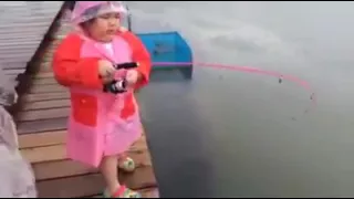 The Cutest Catch. Little Girl Catches Big Fish