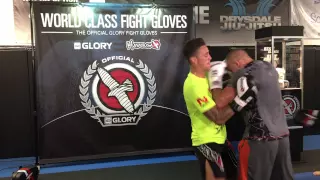 GSP does light sparring with GLORY kick boxer Nieky Holkzken