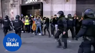 Riot police clash with pro-independence Catalan protesters