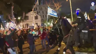 Weekly Israeli anti-government protest in Tel Aviv continues into night