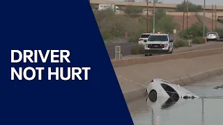 Driver crashes car into canal in Phoenix