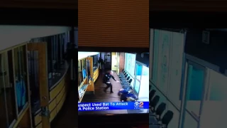 Man hits police station window with bat
