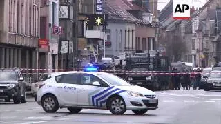 Police snipers at scene after armed men enter apartment