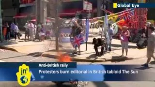 Flag-burning Argentinians protest British sovereignty of the Falkland Islands