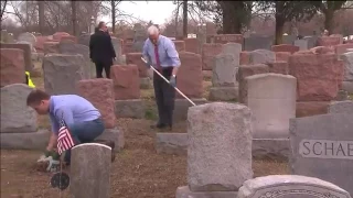 VP Pence makes  surprise visit  to damaged Jewish cemetery and helps with the clean up efforts