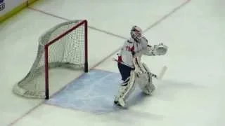 Holtby and Peters during pre-game warm-up at the Capitals @ Senators hockey game