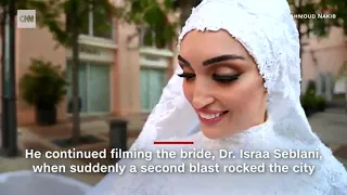 One moment, they were filming the bride in her wedding dress. Then came the explosion