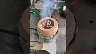 Laser engraving Chinese chess pieces on wood