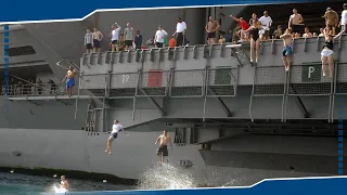 Here's What Happens When US Navy Sailor Loses Grip & Falls Off an Aircraft Carrier