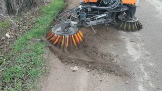 Weed brush for street sweeper