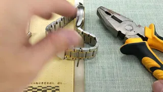 Remove watch strap with steel needle tool