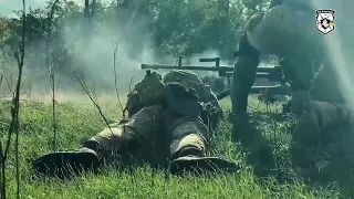 Ukrainian forces in action hammering Russian positions with a NSV 12.7 mm heavy machine gun