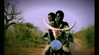 Touki Bouki (1973) by Djibril Diop Mambéty, Clip: Mory and Anta on his famous Zebu horns motorbike