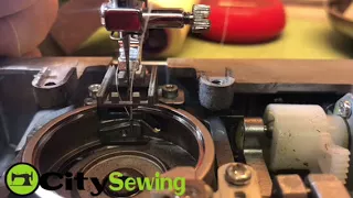 How to adjust the timing on singer machines .