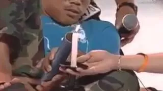 Blowing out candles with fart thru a pipe