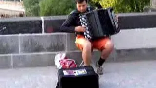 Insane accordion player Prague