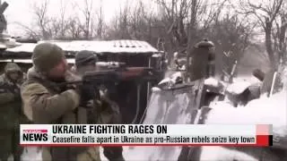 Ceasefire falls apart in Ukraine as pro-Russian rebels seize key town   우크라이나 교전