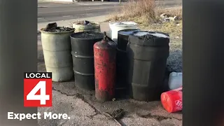 Detroit woman finds leaking barrels dumped outside her home