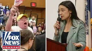 AOC heckled, booed at NYC town hall