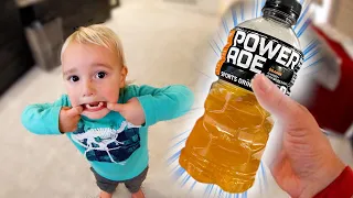 BABY LEARNS TO BOTTLE FLIP!