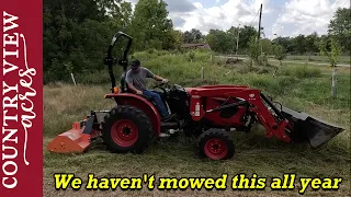 Trying a flail mower on 3 foot tall grass.   Unloading the first load of pipe for Fencing Project.