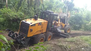 Heavy equipment operator clearing the road,world skill motor grader clg 4165