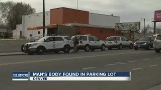 Man's body found in parking lot