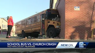 School bus slams into building in Milwaukee, trapping tenants inside