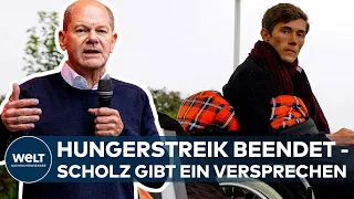 BERLIN: Die zwei verbliebenen Aktivisten beenden Hungerstreik - Olaf Scholz gibt ein Versprechen