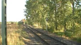 232 489 mit einem vollen Kalkzug in Hedersleben-Wedderstedt