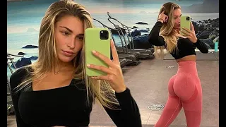 Zara McDermott shows off her VERY peachy posterior in pink leggings