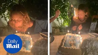 Nicole Richie screams as her hair catches fire on her bday