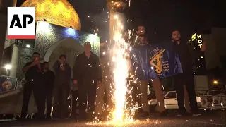 Hardliners celebrate in Tehran after Iran attacks Israel with missiles, drones