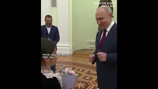 Putin hosts 8-year old girl in Kremlin, hugs her and kisses on the head