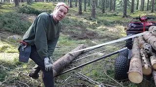 Kuormauskarikoiden testausta ja kuusentaimien istutusta | Talven kuusikuidut pinossa