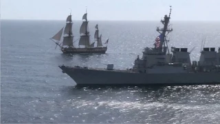 History meets technology as tall ship is escorted by destroyer