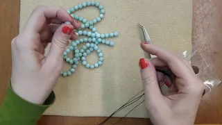 Knotting a mala necklace