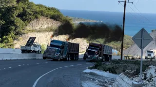 Trucks carrying heavy loads & navigating uphill on a 7.6 steep grade up hill. / S7-E1
