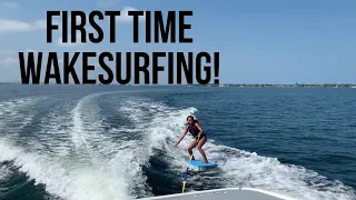MY FIRST TIME WAKESURFING BEHIND A BOAT!