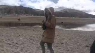 singing "raindrops keep falling on my head" at Namtso, Lhasa, Tibet